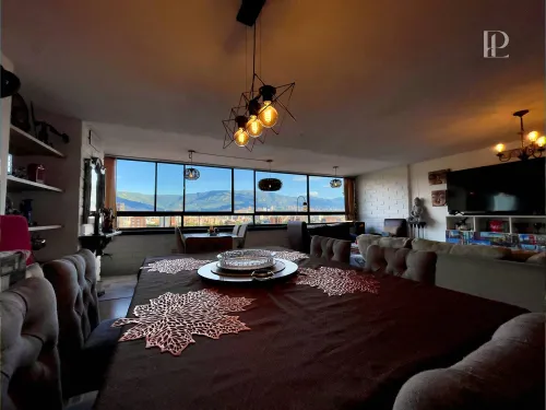 Espacio social abierto en apartamento estrato 5 en Los Colores, Medell&iacute;n